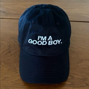 The Classic Black Baseball Cap with White Embroidered Slogan